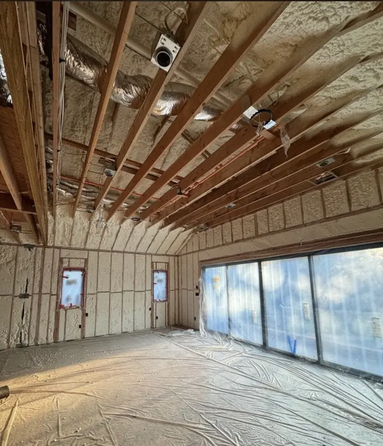 Interior walls and ceiling insulated with spray foam during new construction in Choctaw